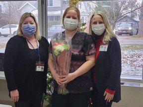 Jenny Martin-Vandongen, centre, a personal support worker at the Norfolk Hospital Nursing Home, was named the home’s 2022 employee of the year recently. Congratulating Martin-Vandongen are Vicky Florio, left, director of care at the nursing home, and Susan Pajor, assistant director of care. CONTRIBUTED