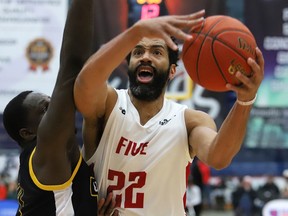 Evan Harris (22) of the Sudbury Five drives to the basket during NBLC action against Flint United at Sudbury Community Arena on Thursday. Sudbury won 130-104. For a full story, go to page B4. John Lappa/Sudbury Star/Postmedia Network