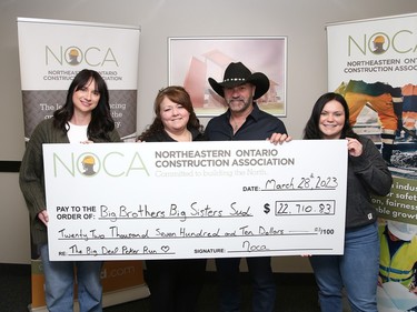 Courtney Dinnes, left, of the Northeastern Ontario Constructjon Association (NOCA), Chantal Gladu-Depatie, executive director of Big Brothers Big Sisters of Greater Sudbury, local entertainer Larry Berrio and Jaiden Tunney, of NOCA, take part in a cheque presentation in Sudbury, Ont. on Tuesday March 28, 2023. Nearly $23,000 was raised for Big Brothers Big Sisters, thanks to the annual Larry BerrioÕs The Big Deal Poker Run, which is a fundraising partnership with the NOCA. The event was held in February. John Lappa/Sudbury Star/Postmedia Network
