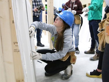 Grade 9 student Andi Sokoloski, 14, of Ecole secondaire catholique La Renaissance in Espanola, learns to install drywall at the Carpenters union local 2486 facility in Azilda, Ont. on Friday March 31, 2023. Grade 9 and 10 students from Renaissance where at the Carpenters union learning about construction trades through the Ontario Youth Apprenticeship Program (OYAP). John Lappa/Sudbury Star/Postmedia Network