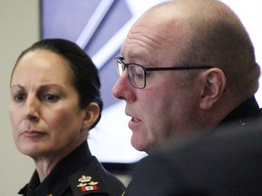 Sarnia police deputy chief Julie Craddock looks on as chief Derek Davis speaks during a Sarnia police services board meeting March 23.