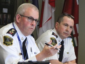 Timmins Police Chief Daniel Foy, left, makes a point during police board meeting where it was announced TPS was in the midst of developing aggressive new incentives to attract recruits while Deputy-Chief Henry Dacosta looks on. Details of those new incentives were announced Monday.

RON GRECH/The Daily Press