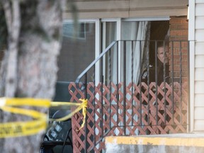 Police guarding a second scene at another apartment building where the main investigation was focused. Edmonton Police investigate a large scene near 132 Street and 114 Ave on March 16, 2023 in Edmonton. Two EPS members were killed in the line of duty after responding to a domestic call in the area.