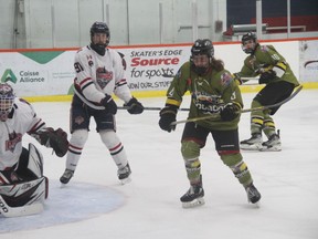 Voodoos blow big lead but rally late to edge the French River Rapids 6-5..