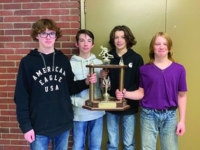 The Milo School curling team won the Vulcan County Junior High Curling League. Pictured here holding the trophy are skip Brody Lamotte, third Preston Headrick, second Cody Walker and lead Carson Lamotte.