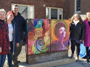 Celebrating International Women's Day on Wednesday at the YWCA St. Thomas Elgin at the unveiling of a new mural dedicated to equity and diversity were, from left, artist Ann-Marie Cheung; St. Thomas-Elgin Community Foundation executive director Natasha Newby; the foundation's McGregor-Morris public art fund representative, Paul Morris; YW communications office manager Melissa Kempf; and YW executive director Lindsay Rice. (Contributed)