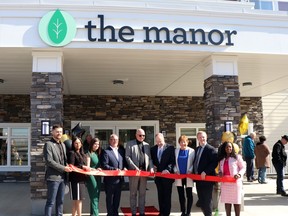 Dignitaries (l-r) Krawford Construction Project Manager Jordan Zakordonski, Christenson’s Executive Associate Reetu Schaaf, Community Manager Katelin Glidden, Chief Operating Officer John Brewster, President Greg Christenson, Mayor Tom Pickard, chamber President Louise Meier, MLA Martin Long and Lifestyle Navigator Faith Boka-Gwinji cut the ribbon on the Manor Friday. The new Whitecourt seniors facility boasts 71 units and already has its first three residents.