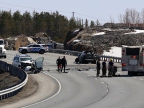 Police and fire services respond to a crash on Big Nickel Mine Drive last year. A Sudbury man is facing nine charges in the case