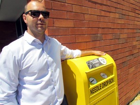 Jon Bouma, Algoma Public Health’s manager of Infectious Disease, stands beside the needle drop bin outside APH’s Willow Avenue office. JEFFREY OUGLER/SAULT STAR/POSTMEDIA NETWORK