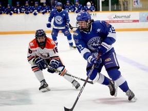 Greater Sudbury Cubs defenceman Kyloe Ellis (89) rushes the puck while Soo Thunderbirds forward Justin Mauro (18) defends during NOJHL action at Gerry McCrory Countryside Sports Complex in Sudbury, Ontario on Thursday, April 13, 2023.