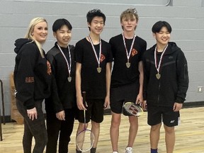 North Park Collegiate coach Amy Steiner stands with CWOSSA medalists (left to right) Cruz Adiwinata, Andrew Song, Pierce Luscombe and Chrisfusion Adiwinata.
