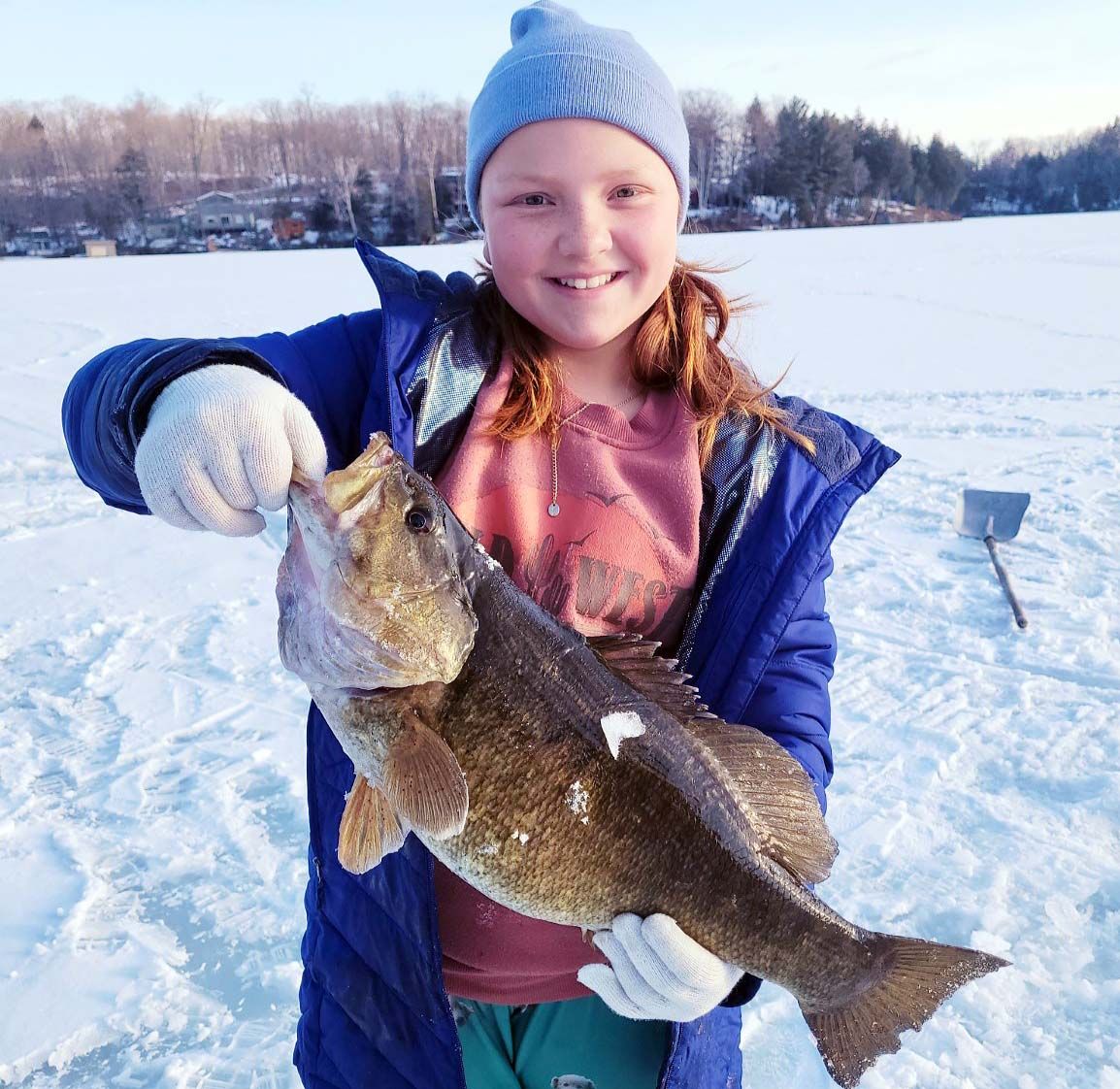 Echo Bay girl lands big smallmouth bass by hand