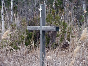 A cross marks the spot of a fatality at the foot of the Mile Hill along Highway 17 North. JEFFREY OUGLER/THE SAULT STAR