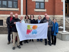 Delegates from both the Festival and City of Kenora gathered outside City Hall on April 13 to raise a flag and mark the month as KDFA month.