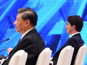 The regime of Chinese President Xi Jinping, left, has malign intentions toward democratic nations such as Canada.