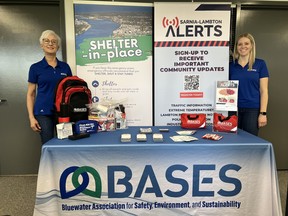 BASES employees Susanne Cook  (left) and Tracy Krull (right) with their Emergency Preparedness Week informational booth  SUPPLIED