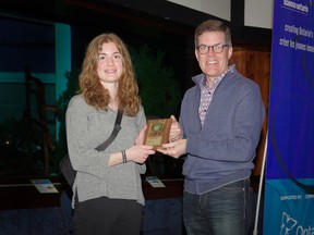 Best of Fair winner Karis Wood poses with Brockville mayor Matt Wren after winning for her project "Gravity...Defied!” at the  Rideau St. Lawrence Regional Science Fair at the Aquatarium last Friday, Mar. 31, 2023.
