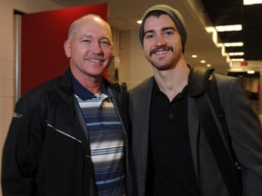 Jay Brodie, left, seen here with his son, NHl defenceman T.J. Brodie in 2013, will be inducted into the Dresden Sports Hall of Fame Saturday night. (Postmedia files)