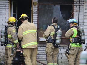 Kingston Fire and Rescue respond to a structure fire at 262 Division St. in Kingston on Monday morning.