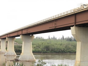 The Peter Lougheed Bridge crosses the Athabasca River north of Fort McMurray and the Fort McKay First Nation on Sunday, August 11, 2019. The 450-metre bridge was initially dubbed the "Bridge to Nowhere" after it was built in 1979 because of the lack of development north of the Athabasca River at the time. Vincent McDermott/Fort McMurray Today/Postmedia Network