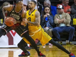 Antwon Lillard of the London Lightning defends against Billy White of the Windsor Express during their game at Budweiser Gardens in London on Sunday February 12, 2023. The Lightning won the game, 108-104. (Derek Ruttan/The London Free Press)