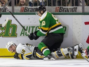 Even Sarnia Sting forward Sasha Pastujov's screams couldn't convince the officials to penalize London Knights' Landon Sim. Instead, Pastujov was given a two-minute penalty for diving during their game at Budweiser Gardens in London, Ont., on Friday, April 28, 2023. Derek Ruttan/The London Free Press/Postmedia Network