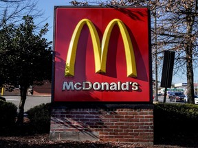 The logo for McDonald's restaurant is seen as McDonald's Corp. reports fourth quarter earnings, in Arlington, Va., Jan. 27, 2022.