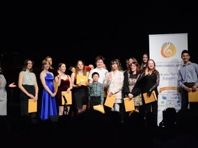Young performers who participated in the Airdrie Rotary Festival of the Performing Arts accept their scholarships awarded for their performances during the April 1 Showcase Concert.