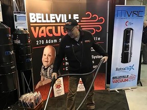 Belleville Vacuum owner Paul Webber keeping the Belleville Home Show booth clean. SUBMITTED PHOTO