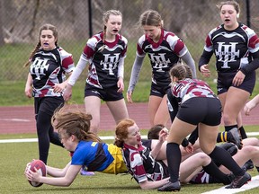 BCI Mustangs ball carrier Georgia Smith scores a try in the first moments of the second half during an AABHN high school senior girls rugby match against the Holy Trinity (Simcoe) Titans on Monday April 24, 2023 in Brantford, Ontario. Brian Thompson/Brantford Expositor/Postmedia Network