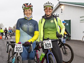 Sandra Fletcher (left) and Robin Hughes, part of the five-member Saddle Sisters of Hyde Park team, arrive at the Paris Fairgrounds on Sunday for the 110 kilometer Paris To Ancaster Cento race.