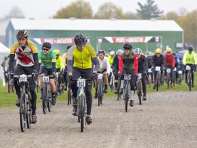 Cyclists in the 110 kilometer Paris To Ancaster Cento race start from the start line at 8 am at the Paris Fairgrounds on Sunday.
