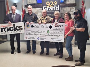 Richard and Lorna Marshall (centre) were presented a cheque for just over $2 million on Friday March 31, 2023 by Rob Phillips (left), president of the Hagersville Chamber of Commerce, Hagersville Lions Club event chair Dan Matten, Hagersville Rocks committee member Tanya Ribbink, and Ray Michaels of 92.9 The Grand. Marshall won the Catch the Ace Draw, in its 45th week. in Hagersville, Ontario. SUBMITTED PHOTO