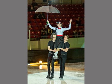 Mary Poppins (Reese Poort) is brought onto the ice by Marty Haubrich (left) and Trennt Michaud during the Brant Skating Club's 70th presentation of Flashing Blades on Friday afternoon. Featuring 175 club skaters and several guest performers, the show continues Saturday, April 8, 2023 at 1 p.m. at the Civic Centre in Brantford. Brian Thompson/Brantford Expositor/Postmedia Network