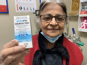 Dr. Ismat Zia Dost of Brantford with a package of Nitro spray, which she always carries with her in case of an emergency. Dost used Nitro spray recently to help a man who suffered a heart attack during a flight from Karachi, Pakistan to Toronto.