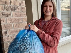 Karleigh Csordas, organizer, along with Taylor Edwards, of the Brantford Butt Blitz, holds a bag of cigarette butts collected during last year's effort. Volunteers are needed for a blitz on Saturday with a goal to pick up 10,000 discarded butts from the downtown in a two-hour timeframe. Anyone interested in helping can meet with organizers in Harmony Square on Saturday at 1 p.m. SUNMITTED