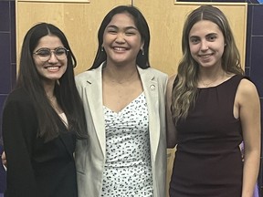 Halaena Buenviage, outgoing student trustee for the Brant Haldimand Norfolk Catholic District School Board, is flanked by Caroline Goveas (left) and Mia Martorelli, who are the new student trustees for the 2023-24 school year. SUBMITTED