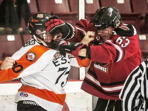 Conor Dembinski, left, of the Essex 73's gets into a fight with Wallaceburg Thunderhawks' Logan Dobransky in a PJHL Stobbs Division quarter-final game at the Essex Centre Sports Complex on Saturday, March 11, 2023.  (DAX MELMER/Windsor Star)