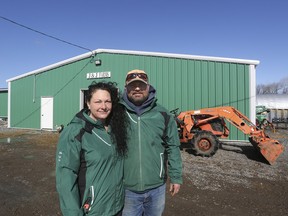 Jenn and James Leadbeater at J&J Farms in Newburgh recently marked the one-year anniversary of a fire that destroyed their barn and killed a number of livestock in March 2022. They're seen with their brand-new barn on Saturday, April 1, 2023.