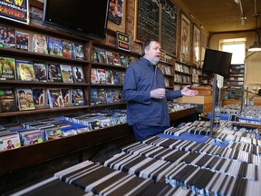 Tom Ivison, owner of Classic Video, talks Thursday about his decision to close after 35 years in business in Kingston.