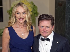 Actor Michael J. Fox was diagnosed with Parkinson's disease in 1991 when he was only 29 years old. He is seen here with his wife, Tracy Pollan.