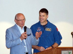 In this file photo, then Lambton-Kent-Middlesex MP Bev Shipley, left, took a few minutes to thank Col. Jeremy Hansen, right, for serving and giving back to his country at an award ceremony for Hansen on May 26, 2018 in North Middlesex. Hansen, who attended McGillivray Central School, will orbit the moon with a NASA crew in 2024. William Proulx file photo