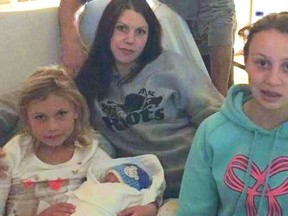 Photo provided by Eric Armstrong. 
This is the last photo taken of Alicia Armstrong and her children, Whyitt, Chloe and Desire, shortly before Alicia was murdered.