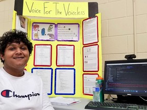 Vedant Sheel with his science fair project which uses machine learning and computer vision to turn sign language into English text in real time, at the Bluewater Regional Science and Technology Fair in Owen Sound in April. (Scott Dunn/The Sun Times/Postmedia Network)