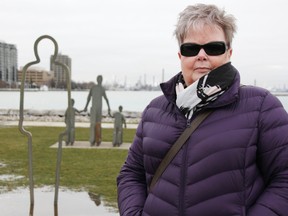 Sandra Kinart stands at the Missing Worker Memorial in Centennial Park.  The April 28 Day of Mourning event in Sarnia is returning to the memorial for the first time in years.  (Tyler Kula/ The Observer)