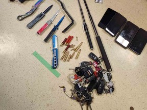Lambton OPP say drugs and weapons were seized after mismatched plates led police in Plympton-Wyoming to identify a stolen vehicle Tuesday. (Submitted)
