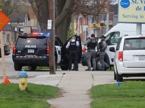 Sarnia police are shown at the corner of Davis and Euphemia Streets Tuesday morning.  Police said in a statement there was an incident in the area of ​​125 Euphemia St.