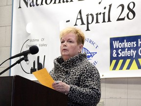 Sandra Kinart, of Victims of Chemical Valley, speaks at a national day of mourning event in 2019 at Sarnia's East Street fire hall. The  event is returning to the fire hall on April 28.