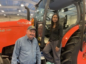 Ken Hodge of Ken Hodge Farms in Harley with Mayumi Sripathmarajah of St. Joseph's School in Simcoe at the thinkAg Career Competition held in The Aud at the Simcoe fairgrounds on Wednesday. Mayumi was one of 650 students from the Brant Haldimand Norfolk Catholic District School Board and the Grand Erie District School Board to participate in the event put on by AgScape and the Workforce Planning Board of Grand Erie. VINCENT BALL