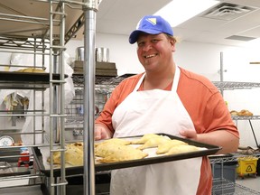 Head baker Aaron Laakso, of Leinala's Bakery, prepares turnovers at the new location at 1769 Regent St. in Sudbury, Ont. on Monday April 24, 2023. The bakery opened its doors today at the Eddie's Restaurant mall, five months after moving from the former location on Caswell Drive. John Lappa/Sudbury Star/Postmedia Network